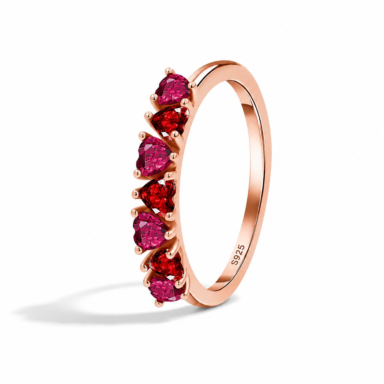 7 Hearts of Love Ring in 925 sterling silver with rose gold plating and ruby garnet heart stones Pakistan