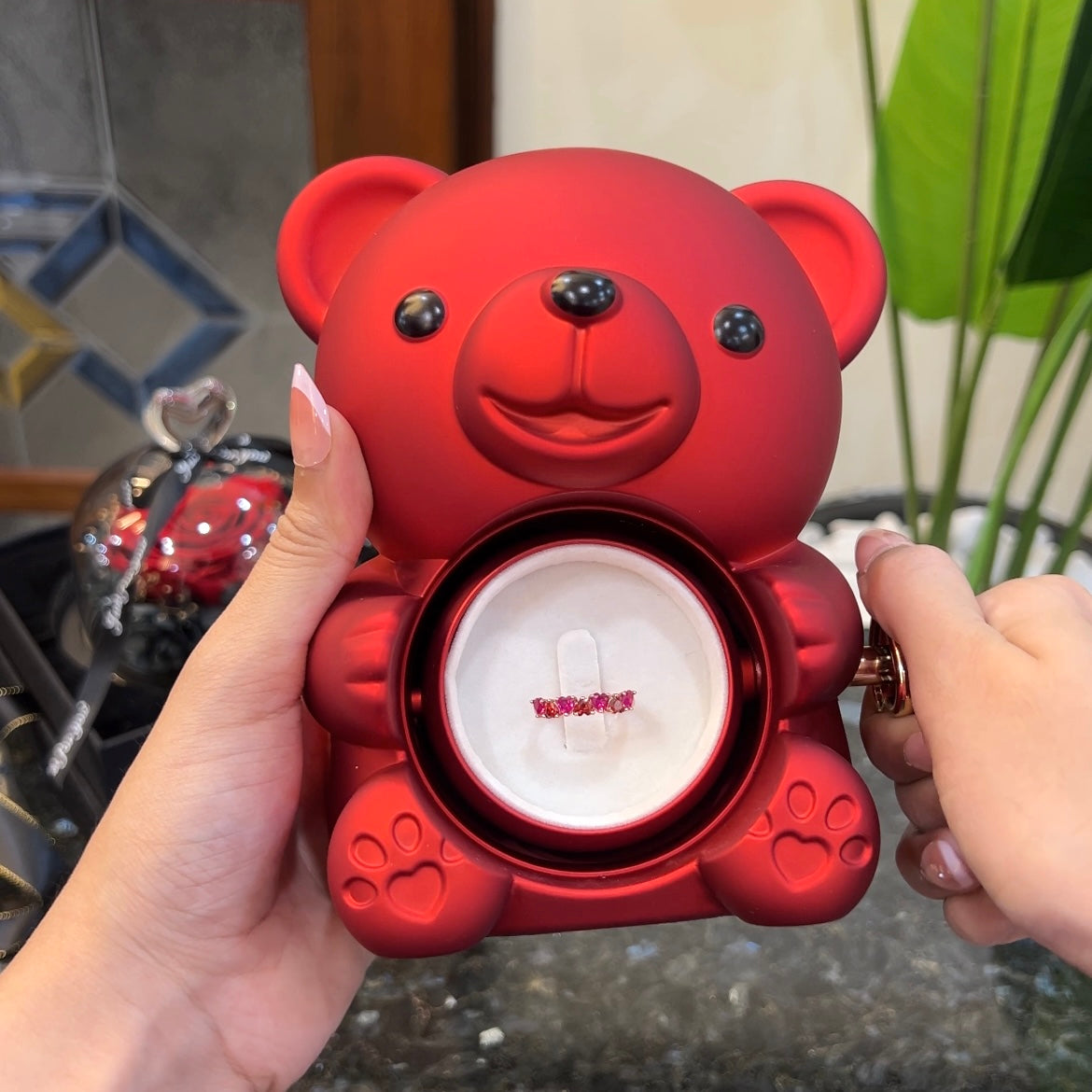 7 hearts of love ring inside hidden compartment of red teddy bear rose box