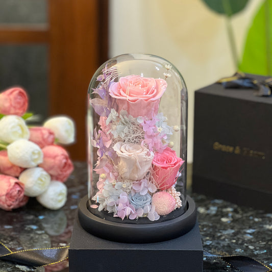 Blush Eternelle - preserved pink, cream and blue roses with hydrangea under a tall glass dome