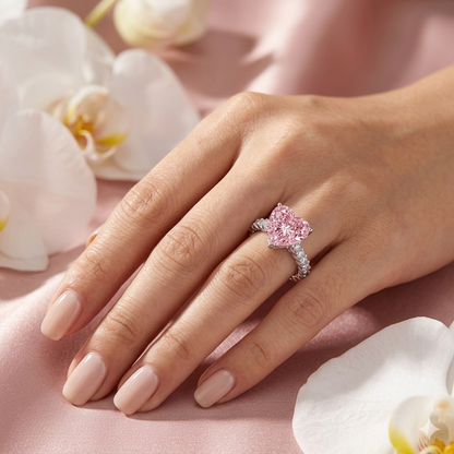 Woman wearing Blush Heart Ring with pink heart gemstone design
