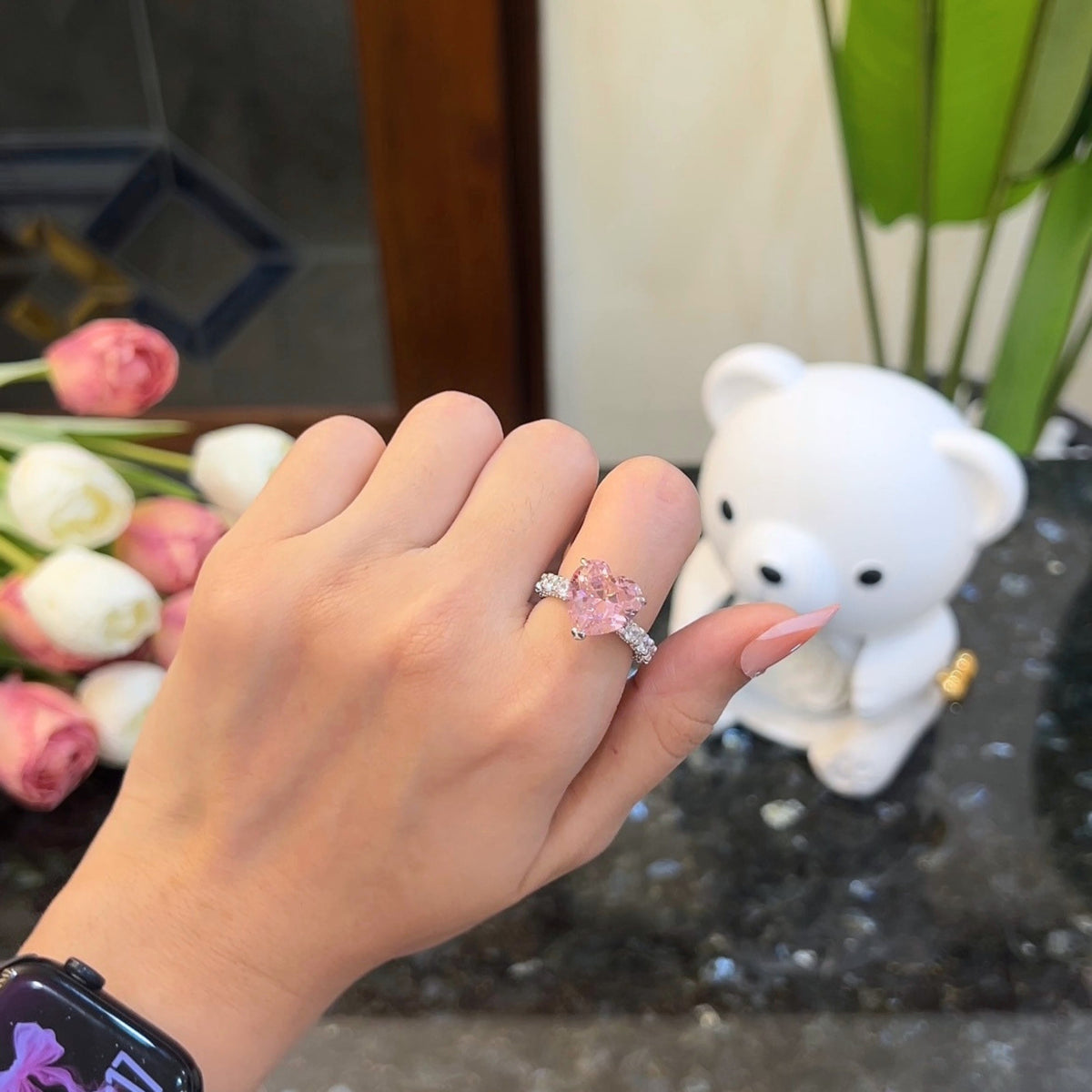 Model wearing Blush heart ring on hand, 925 sterling silver ring 