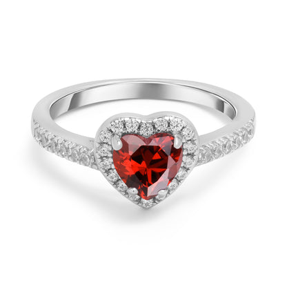 Close up of Elite Heart Ring featuring red heart shaped zircon stone in sterling silver