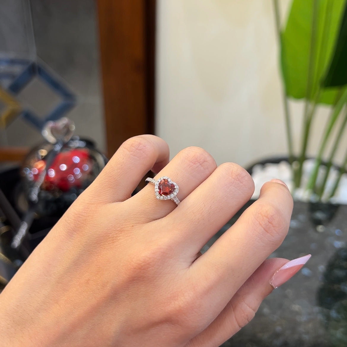 Red heart Elite Heart Ring worn on hand, 925 sterling silver