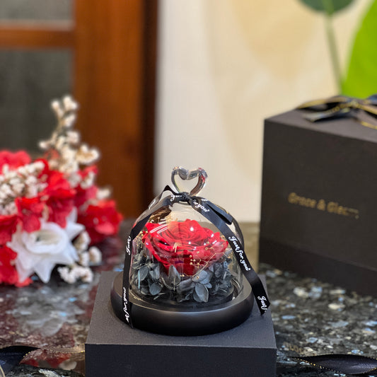 Fairy Preserved Rose – Red, a single preserved red rose under a heart-topped glass dome