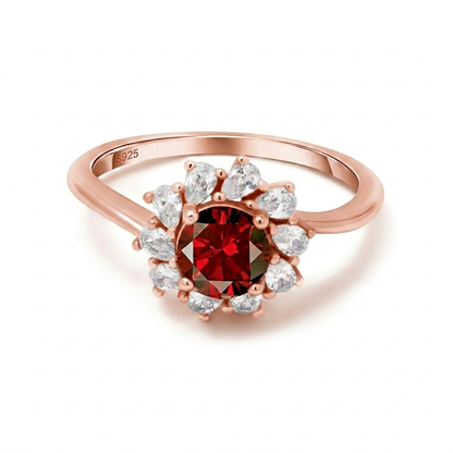 Rose gold floral ring with red centre zircon and pear shaped zircon petals