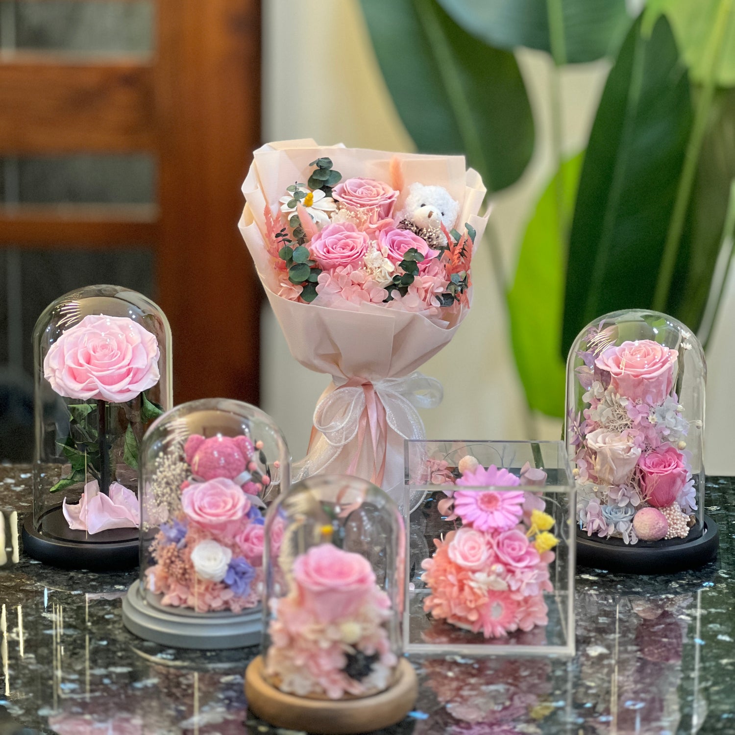 Grace & Gleam forever flowers range - preserved rose domes, rose bear and a bouquet