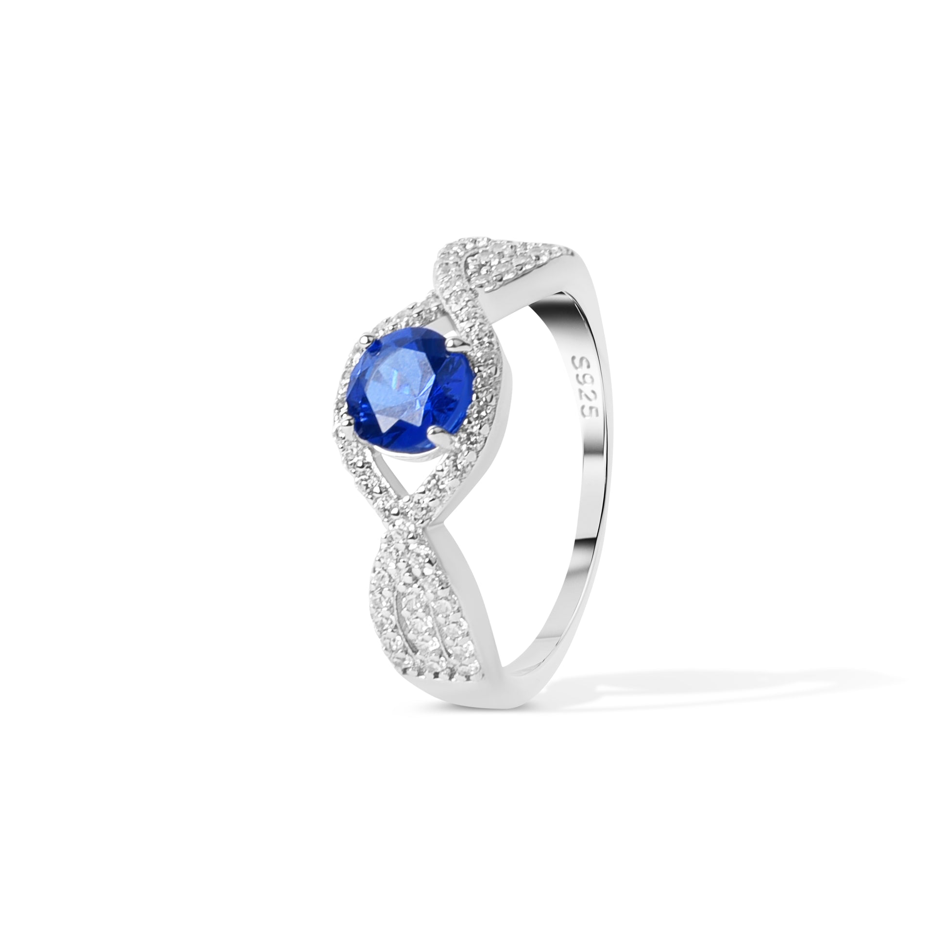 Side angle of infinity style blue zircon silver ring for women
