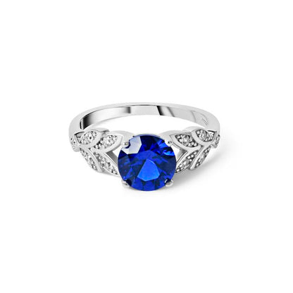 Midnight petals ring for women with blue stone and floral design
