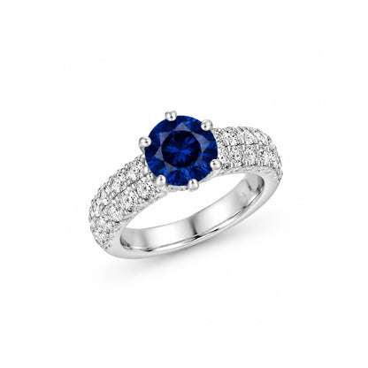 Ocean Blue Ring angled view — sapphire-blue zircon and double-row pavé band in 925 sterling silver