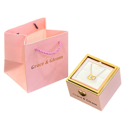 Double heart necklace revealed inside pink surprise birthday gift box Grace & Gleam