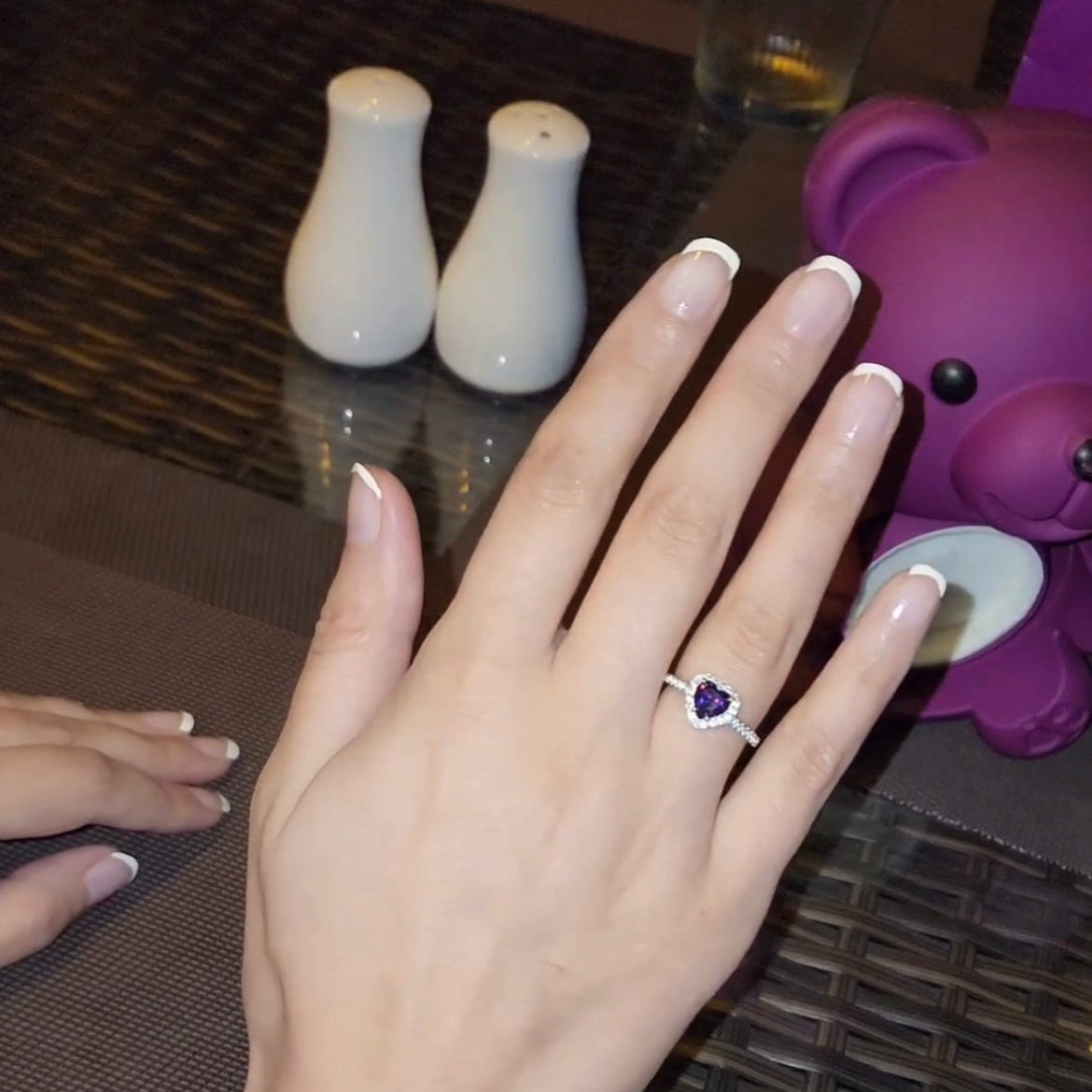 Purple heart-shaped silver ring for women, on-hand view